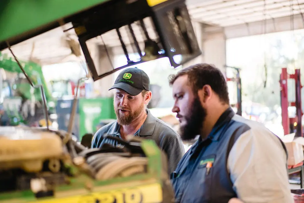 technicians with tractor