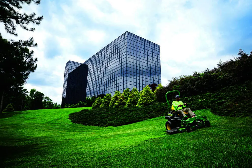 Landscaper mowing with zero turn mower!