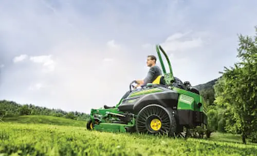 Technician operating a ztrak mower