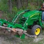 Debris Grapple on John Deere compact utility tractor