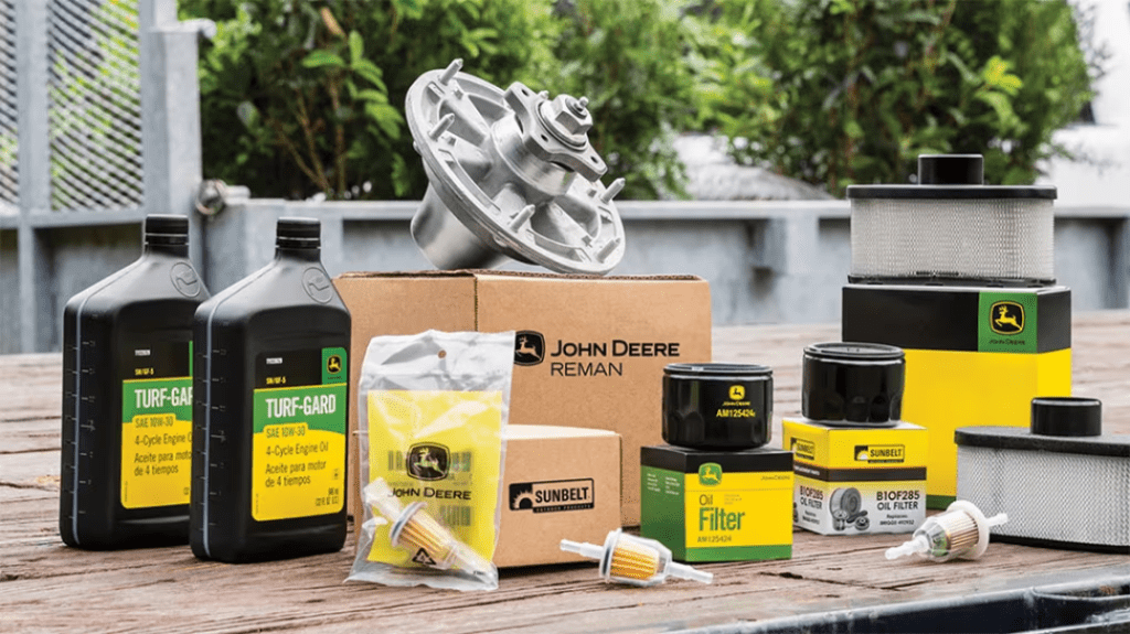 An assortment of John Deere parts and accessories