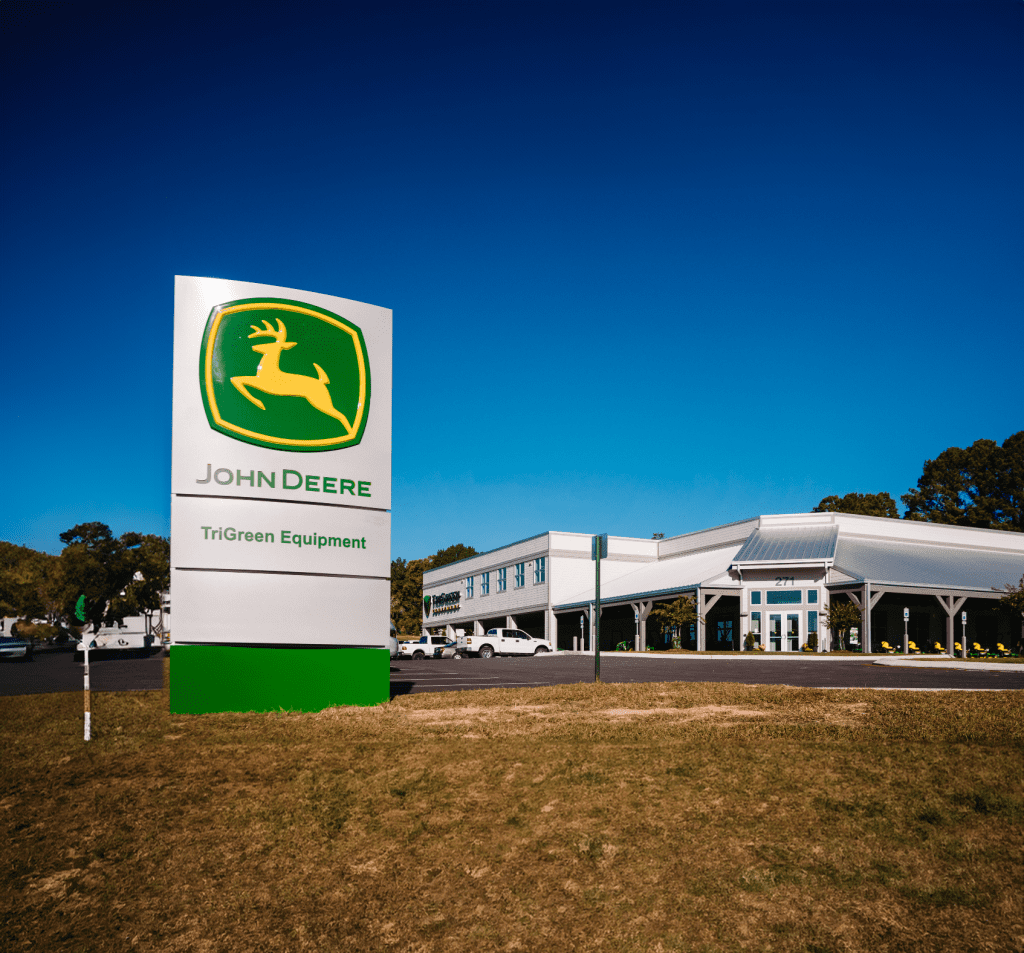 TriGreen Equipment John Deere dealership sign and storefront in Columbia, TN