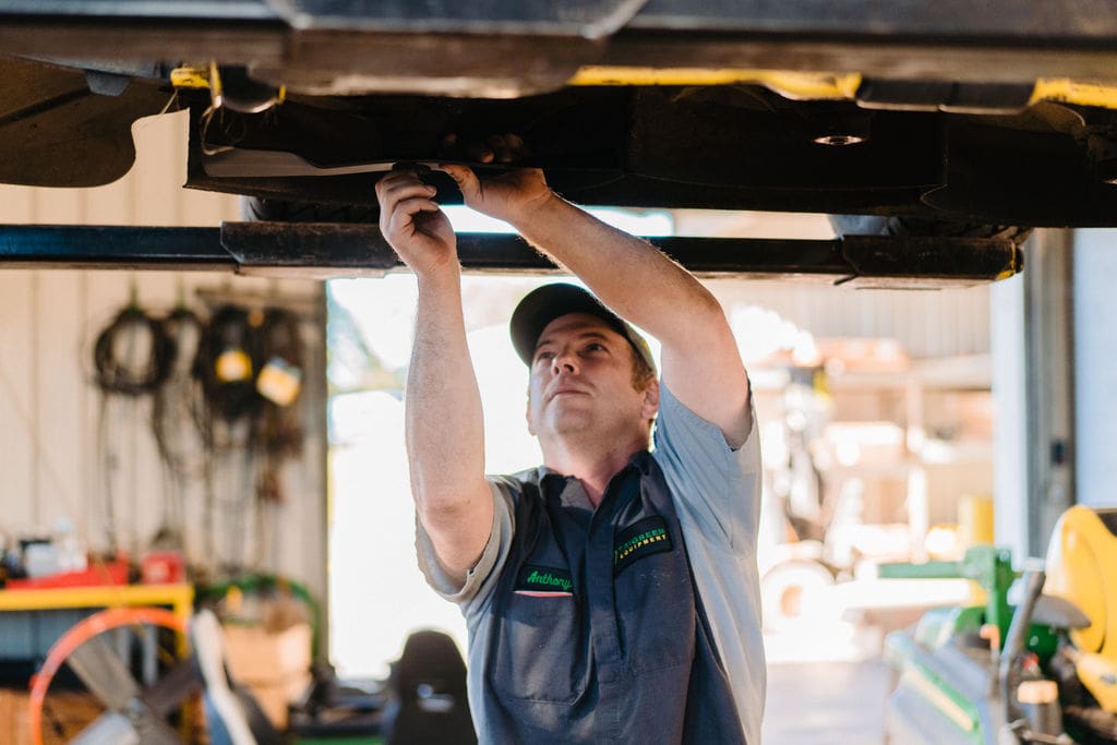 mechanic working on machine maintenance