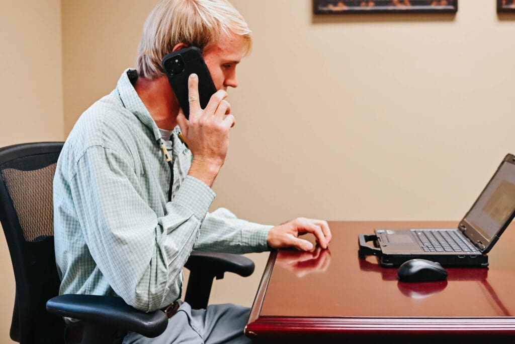 Technician taking phone call.