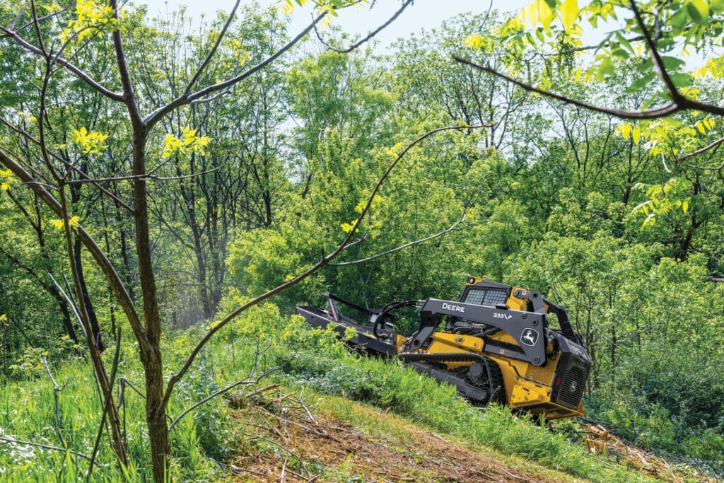 Compact Construction equipment being used for a landscaping job