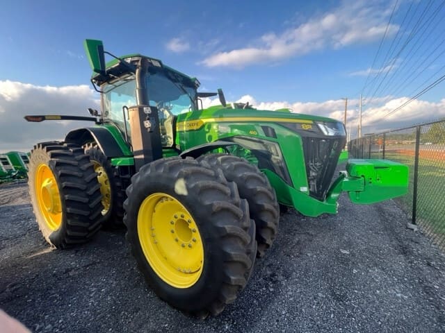 Used John Deere agriculture tractor on a TriGreen Equipment dealership lot
