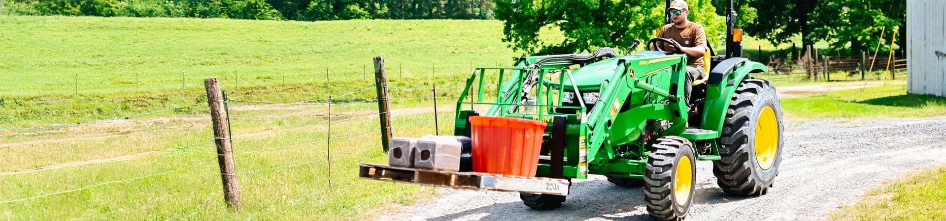 4 series compact tractor being used to cary some items
