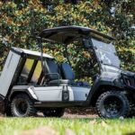 John Deere GX Electric Gator dumping dump bed